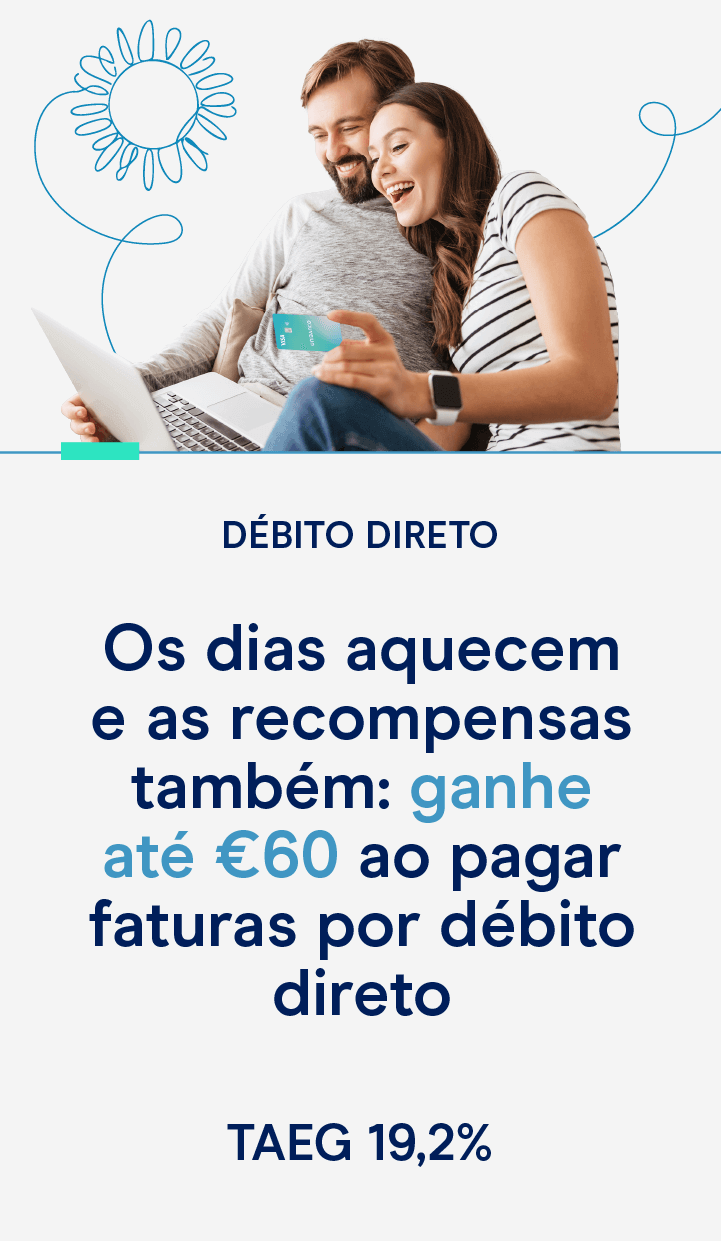 Casal com o cartão de crédito unibanco simulando uma domiciliação de uma compra